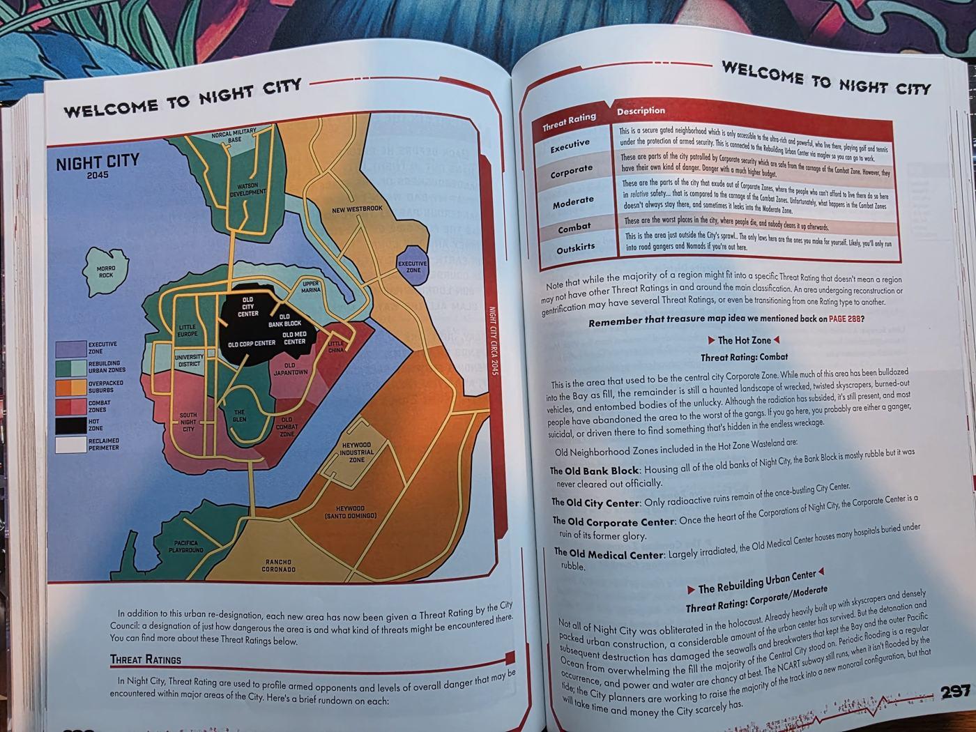 The Welcome to Night City spread, with a color-coded map of the city's threat zones