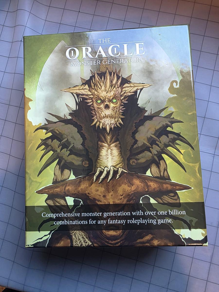 The Oracle Monster Generator box, with a spiked monster on the cover