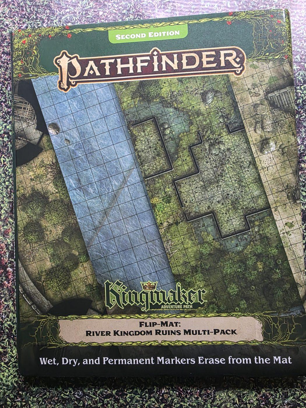 The Pathfinder Second Edition Kingmaker Flip-Mat River Kingdom Ruins Multi-Pack cover, which says wet, dry and permanent markers erase from the mat